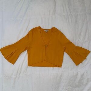 Eva Mendes Orange V-Neck Bell Sleeve Crop Top